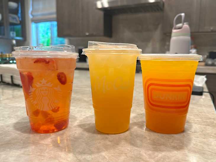 3 brands of mango refreshers on countertop