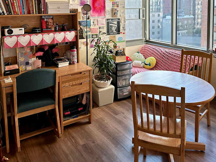 desk/workspace and dining table in white dorm room