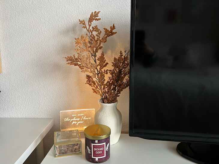 finished project with painted glass jar