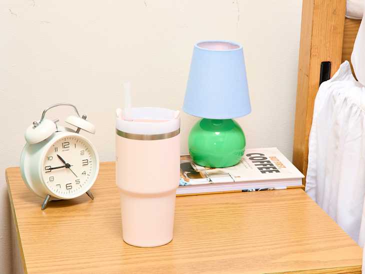 nightsand of clean girl dorm room