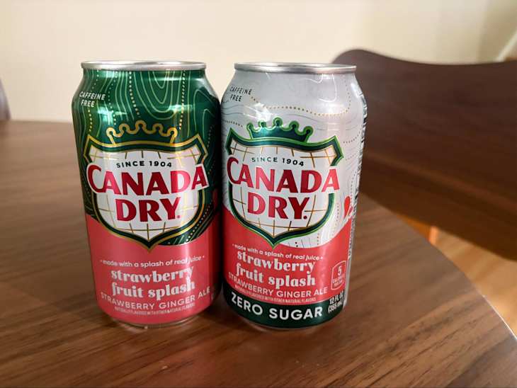 Two cans of Strawberry Fruit Splash one with zero sugar.