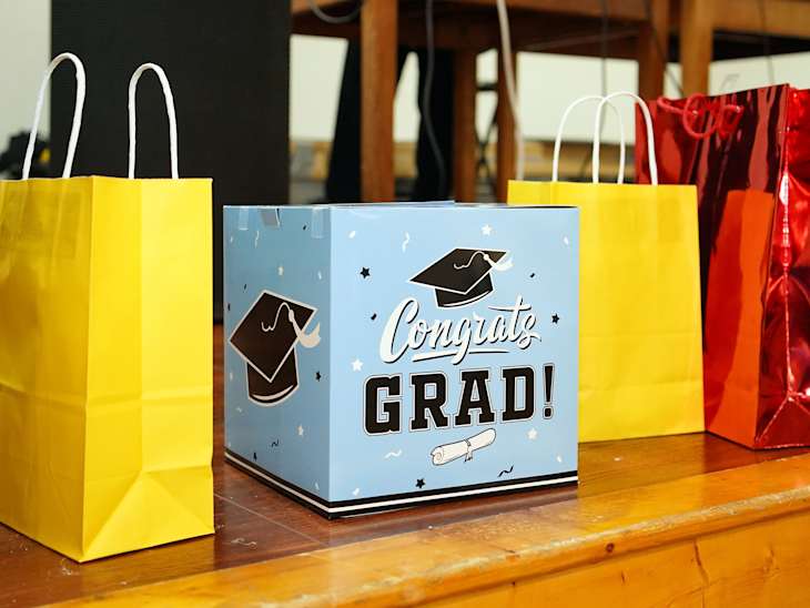 Closeup shot of colorful bags and displays to congratulate on graduation