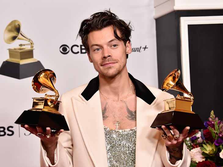 FEBRUARY 05: Harry Styles poses with the Best Pop Vocal Album Award for “Harry’s House” and Album of the Year Award for “Harry’s House” in the press room during the 65th GRAMMY Awards at Crypto.com Arena on February 05, 2023 in Los Angeles, California. (