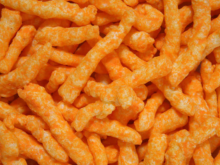 A closeup view of crunchy cheese snacks