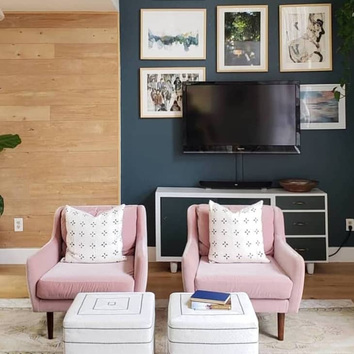 a modern living room with a statement wall