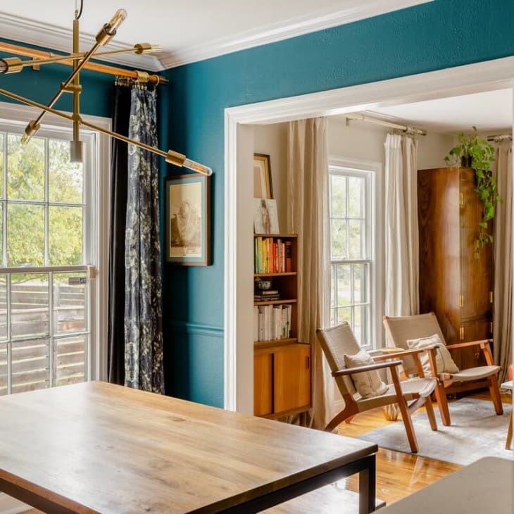 Dining room with teal walls