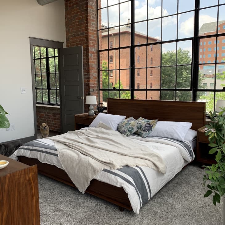 Bedroom with large wall of windows