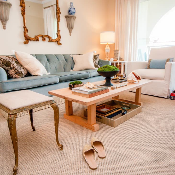Living room with light blue and neutral color scheme