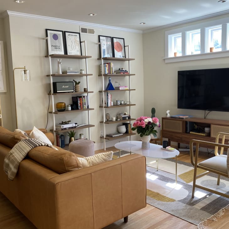 Living room with with sleek furniture and leather sofa