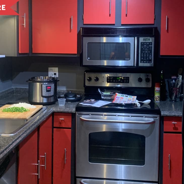 Before: Kitchen with red cabinets