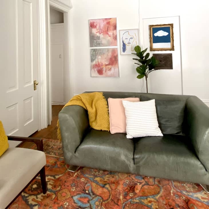 Colorful living room with orange rug