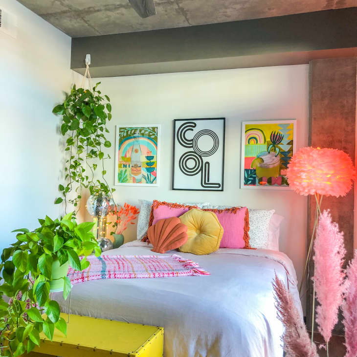 Bedroom with plants and pink lights