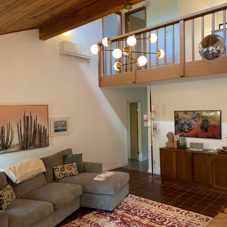 The living room with a view of the upstairs floor