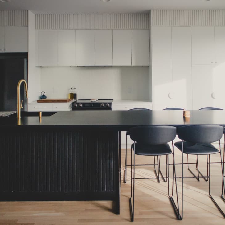 A kitchen island that includes a dining table