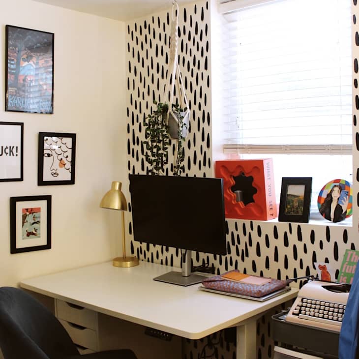 Home desk/workspace with black and white wallpaper accent wall