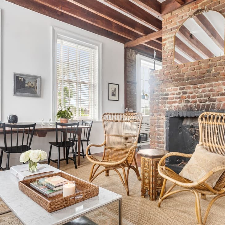Picture of A stylish duplex apartment with an exposed brick bedroom wall