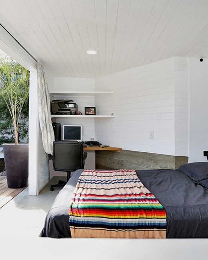 a gorgeous modern bedroom with envious California views