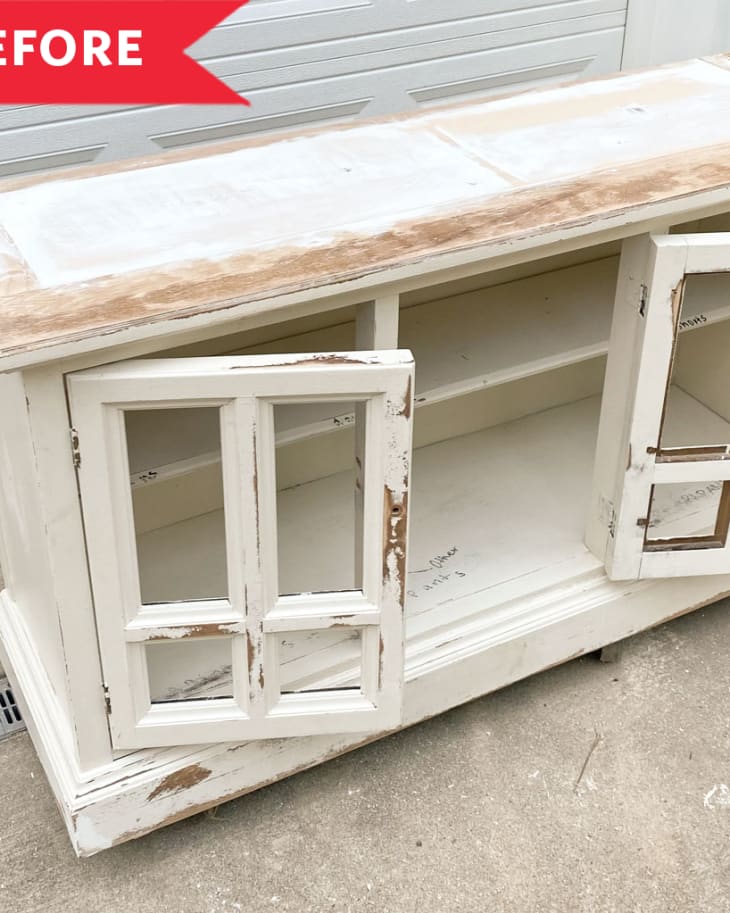 Before: Lower half of faded, chipped white hutch with glass front cabinet doors