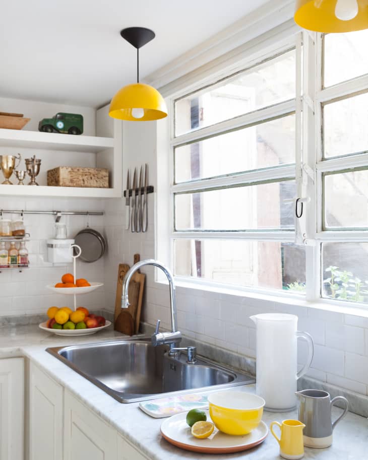 This Under-Sink Mat on  Makes Cleaning Under the Sink Easy