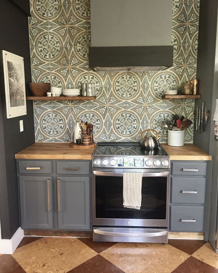 Kitchen with green wallpaper