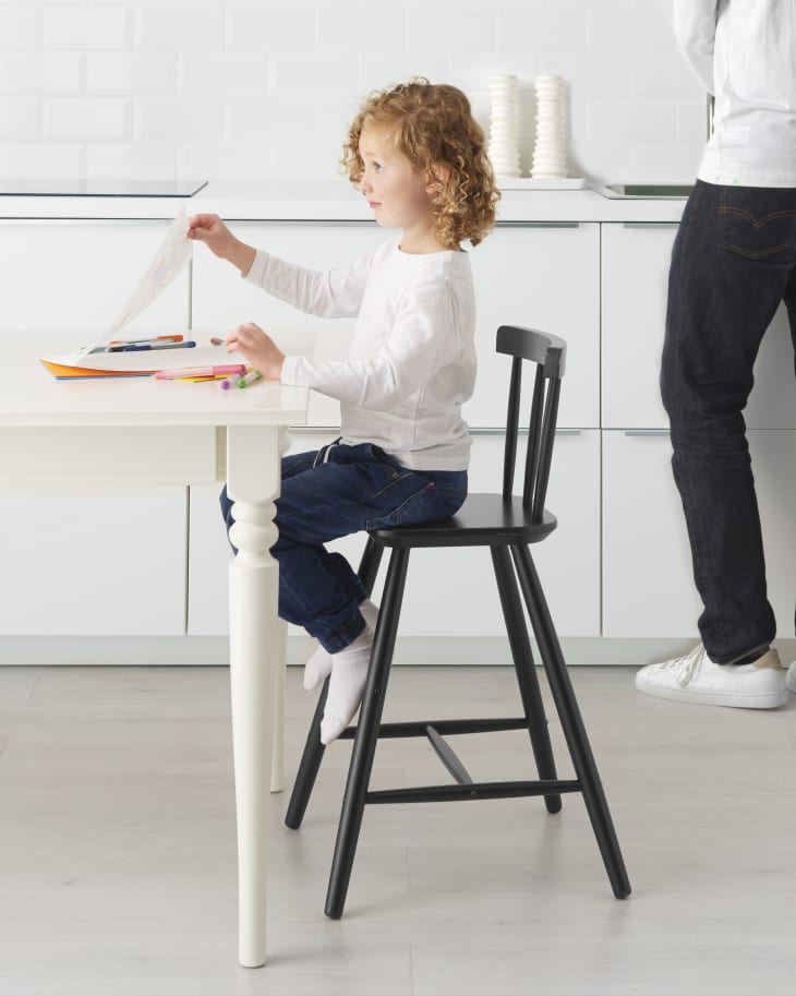 Child Sitting in IKEA youth chair