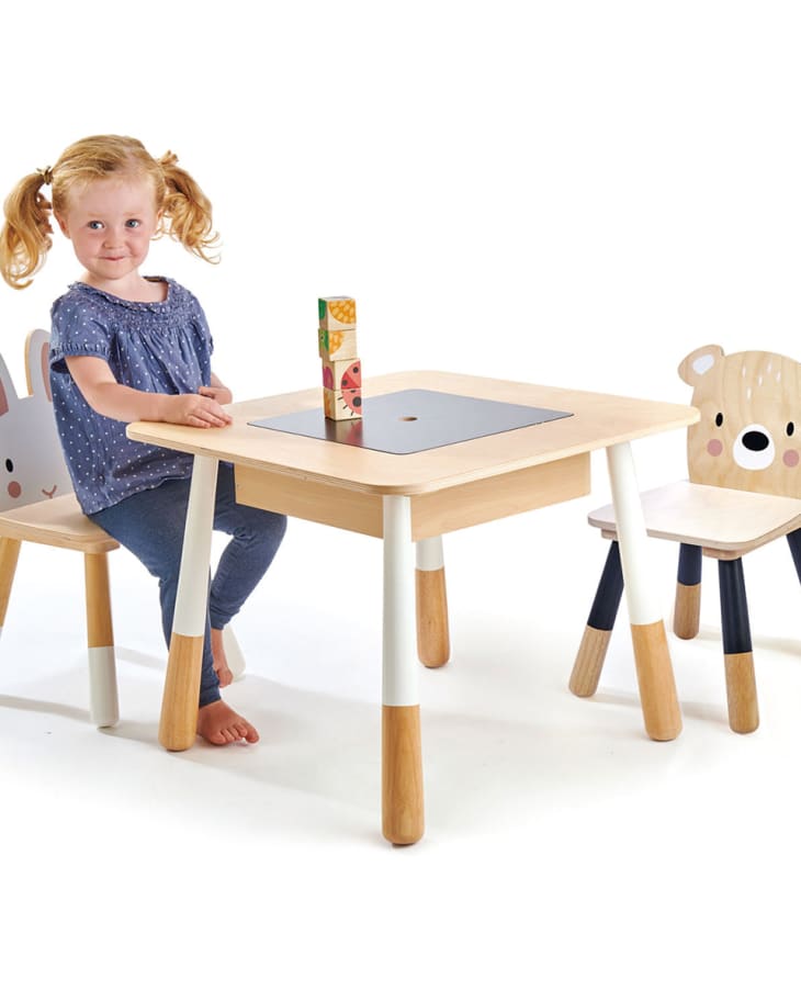 little girl sitting at tender leaf toys table and chair set