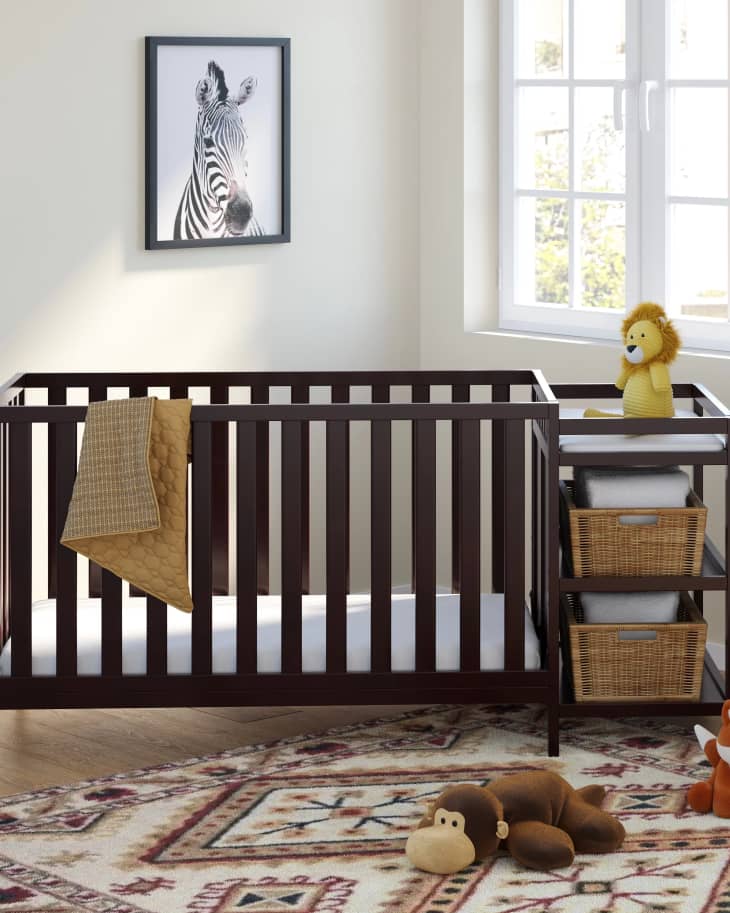 dark wood crib and changing table combo