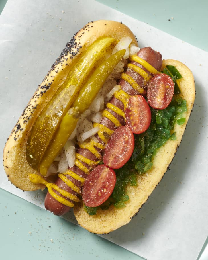 one chicago style hot dog on parchment paper