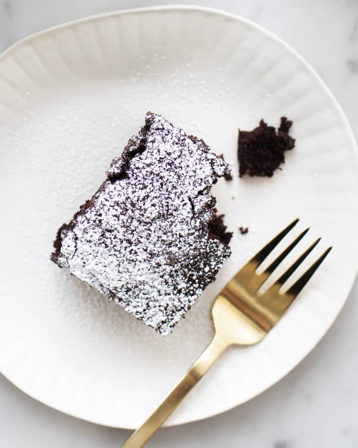 fudgy chocolate cake with powdered sugar