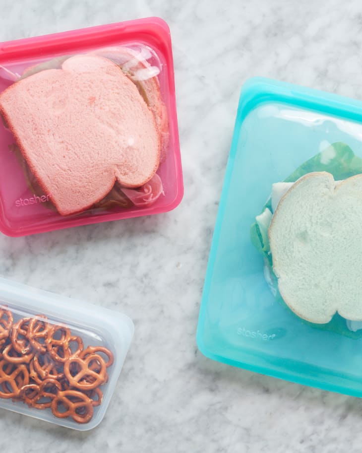 Sandwiches and snacks in reusable silicone bags.