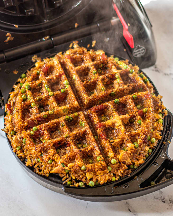 https://cdn.apartmenttherapy.info/image/upload/f_auto,q_auto:eco,c_fill,g_center,w_730,h_913/k%2FEdit%2F2022-05-Crispy-Rice-Waffles%2FCrispy_Fried_Rice_Waffles-Process4