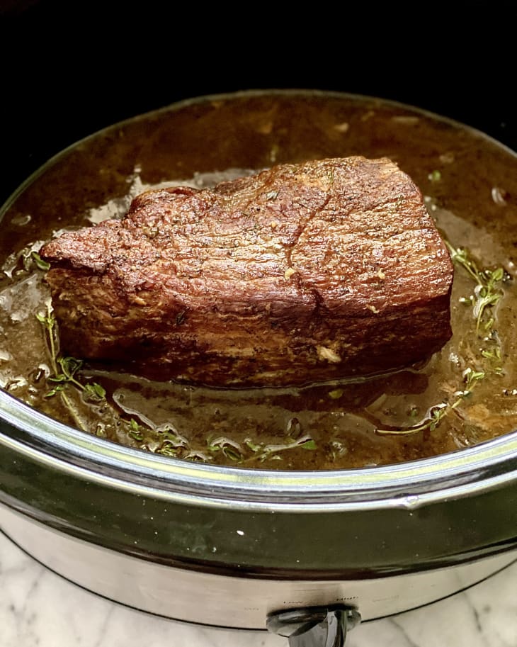 https://cdn.apartmenttherapy.info/image/upload/f_auto,q_auto:eco,c_fill,g_center,w_730,h_913/k%2FEdit%2F2022-11-Slow-Cooker-Roast-Beef%2Fslow-cooker-roast-beef-1