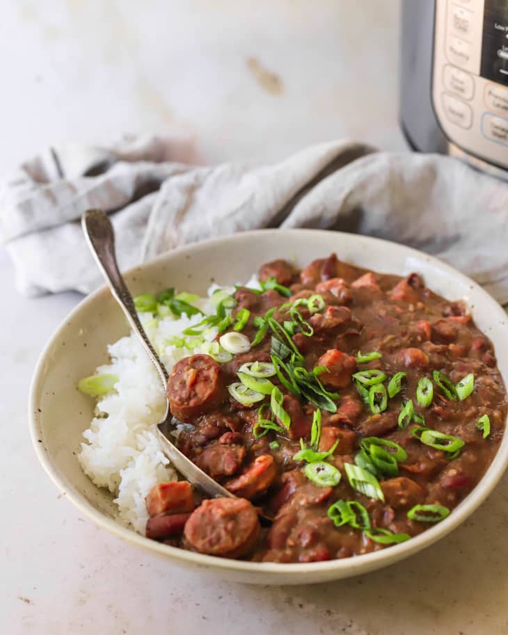Instant Pot red beans and rice in a white serving bowl.