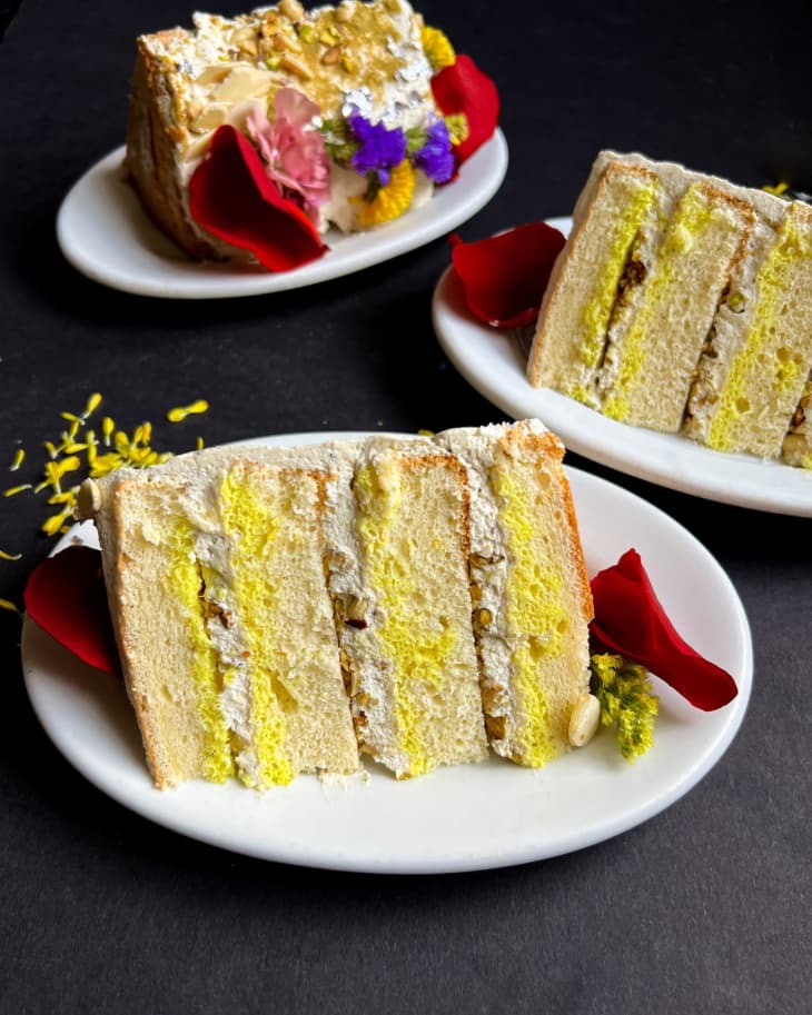 Plated slices of Thandai layer cake.