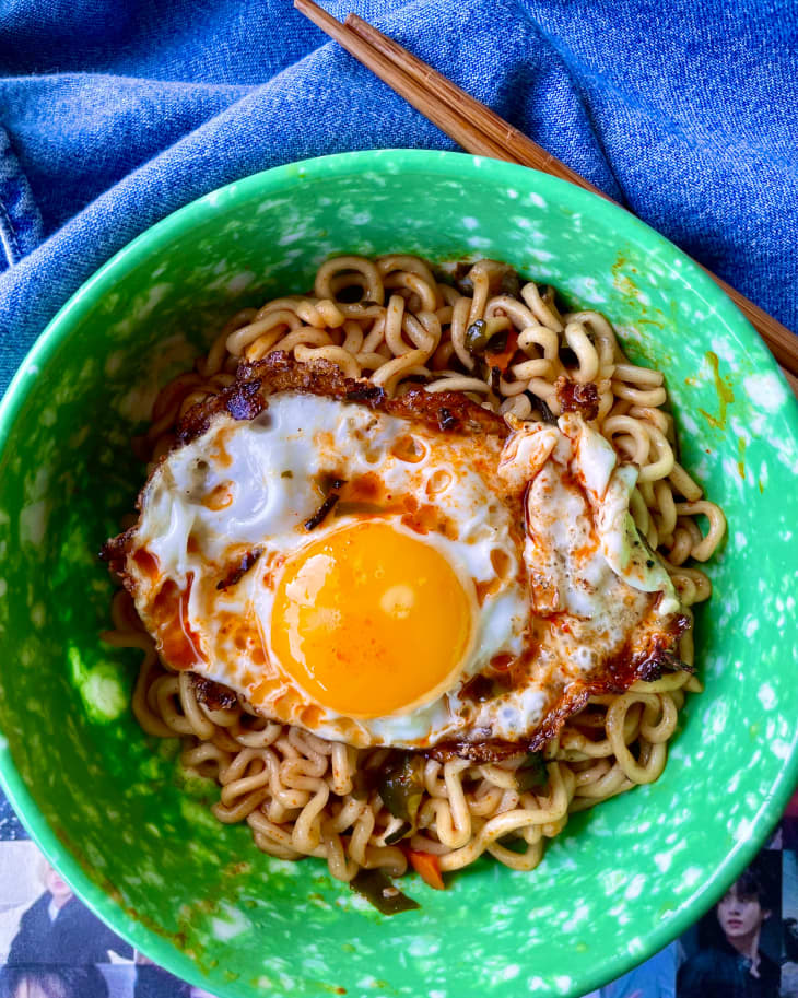 BTS ramen in bowl with egg on top.