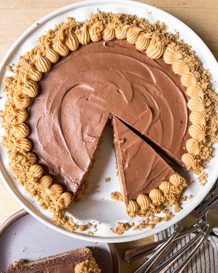 Copycat Costco chocolate peanut butter pie with slice ready to be plated.