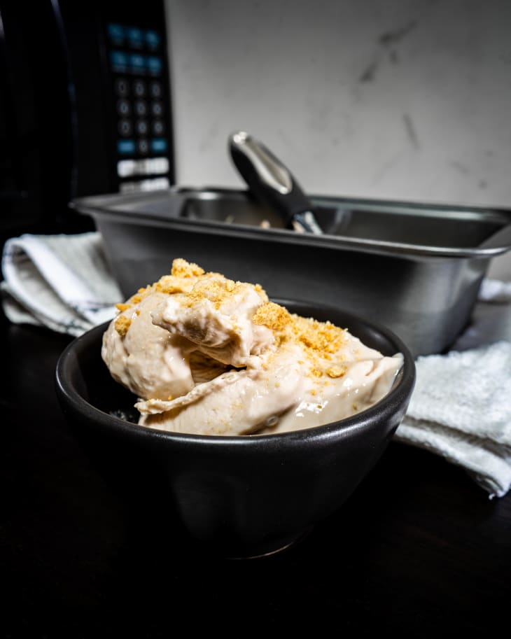 Cottage cheese ice cream in a bowl with crunchy topping.
