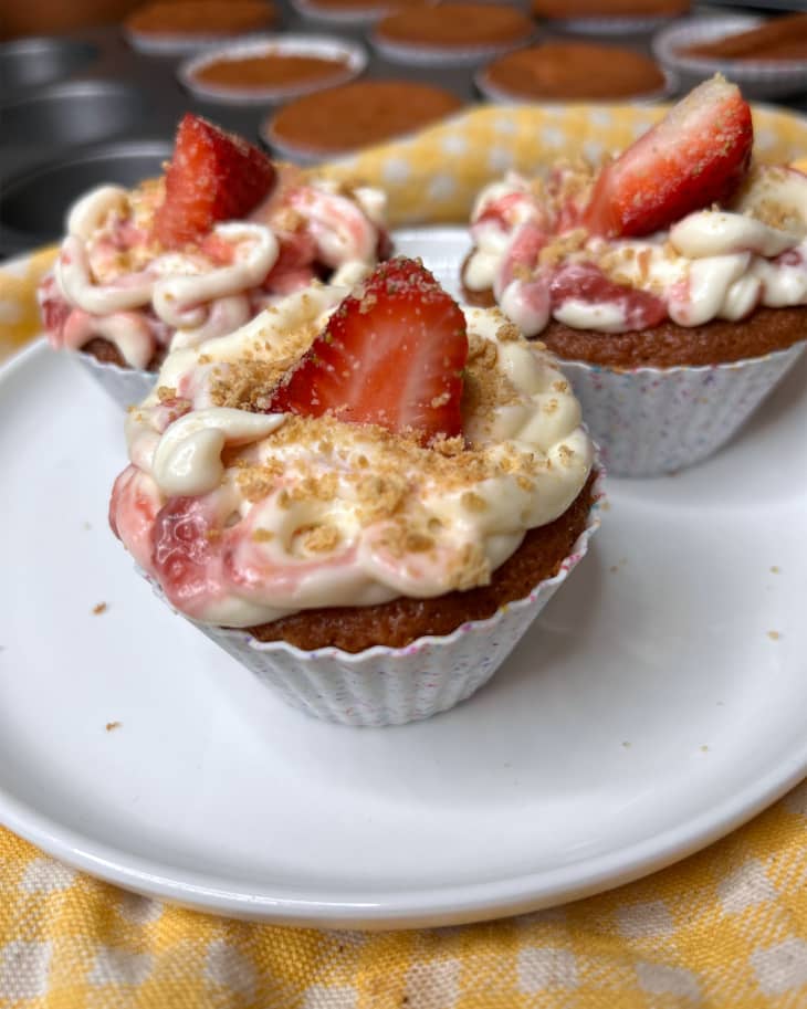 King Arthur's Strawberry Cheesecake Cupcakes decorated on plate.