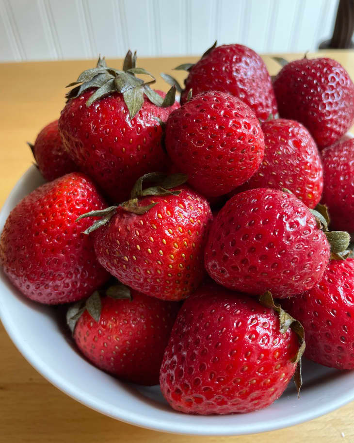 Whole strawberries in a bowl.