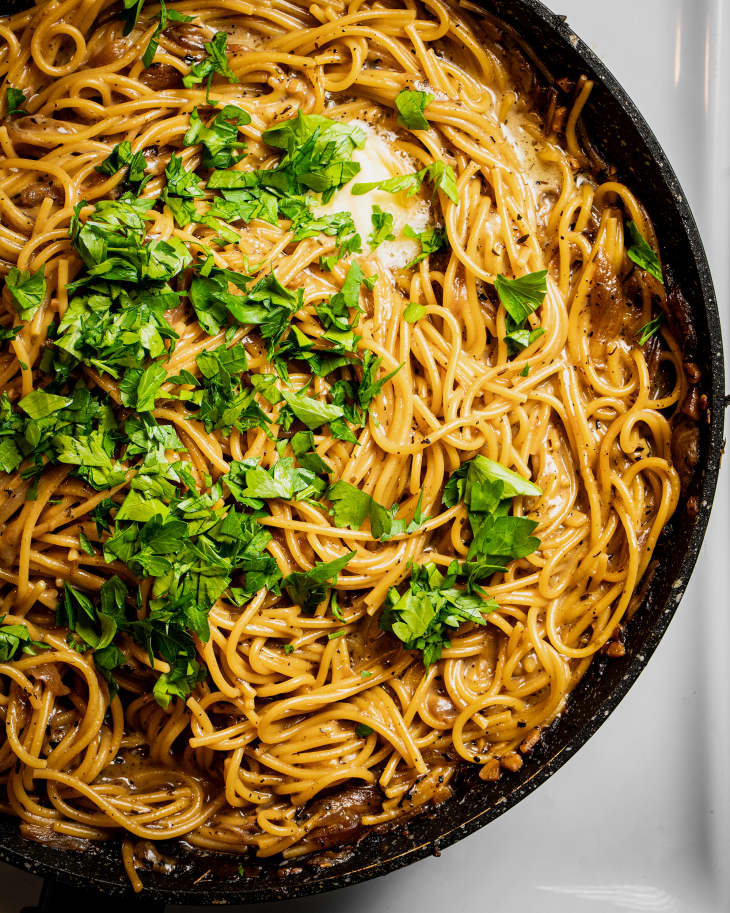 French onion soup noodles in skillet.