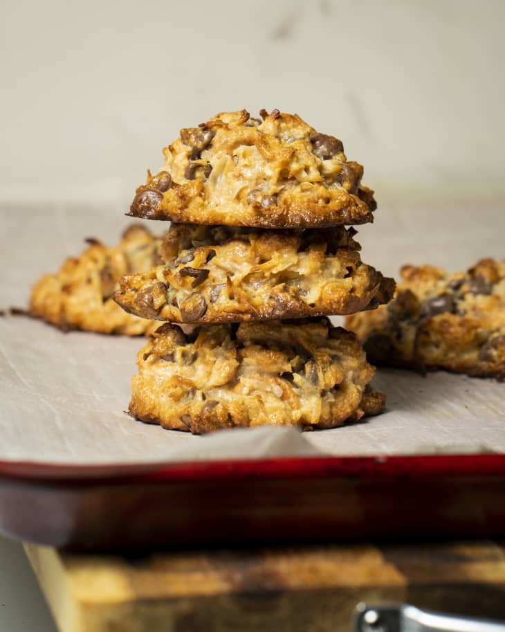 clumpy cookies on a sheet pan, parchment paper, chunky cookies with lots of oats and lumpy ingredients, chocolate chips