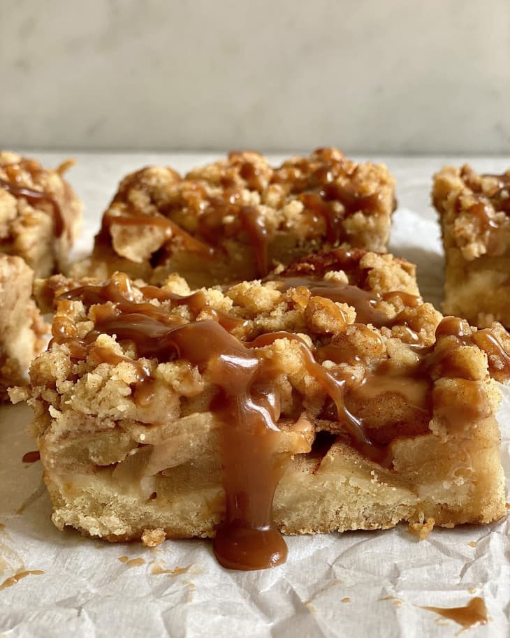 Close-up of salted caramel-covered apple pie bars.