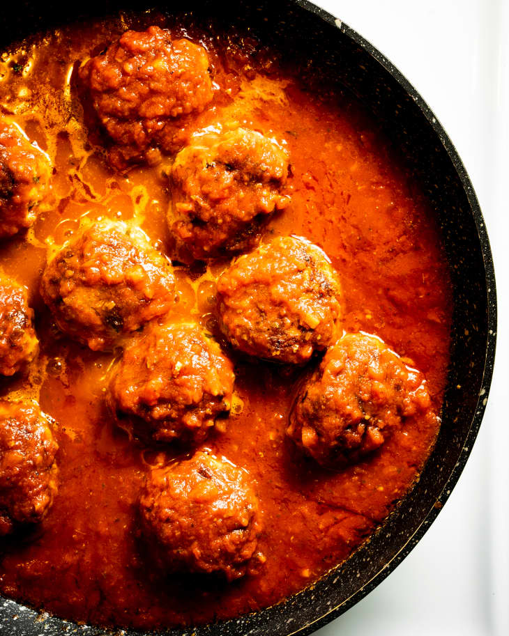 Italian meatballs in skillet.