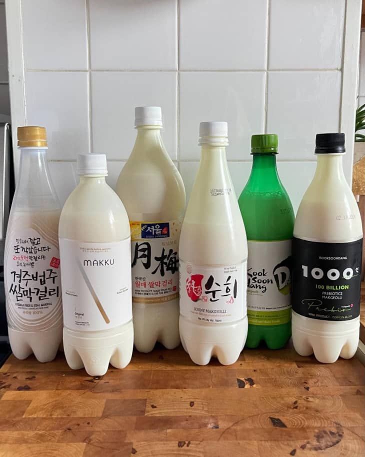 group of bottles of various brands of Makgeolli