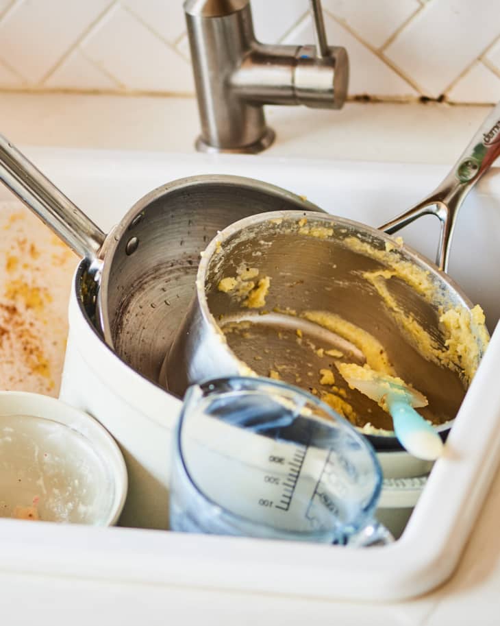 Sink full of dirty dishes.