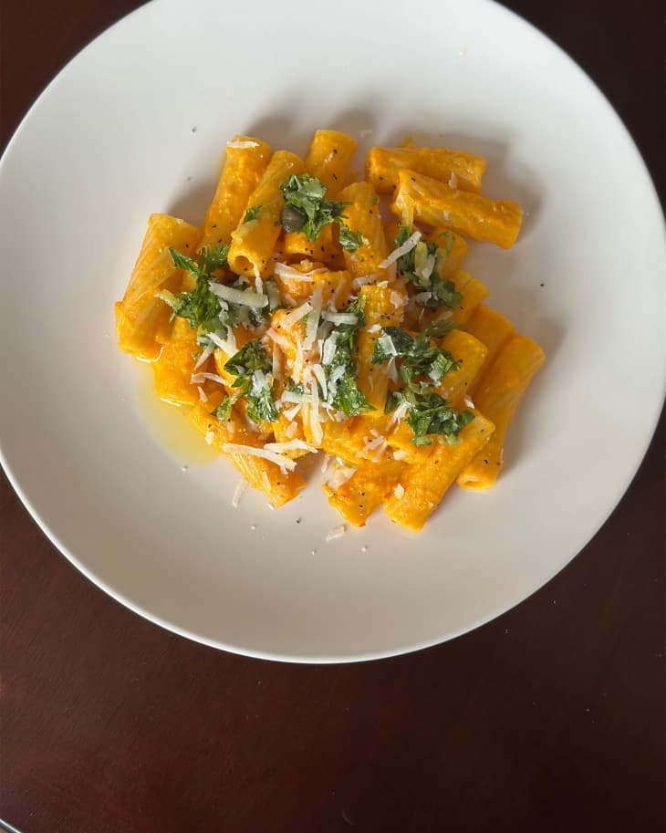 Spicy carrot pasta on a plate.
