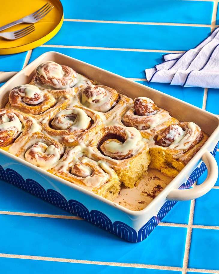 baking dish with cinnamon buns in them