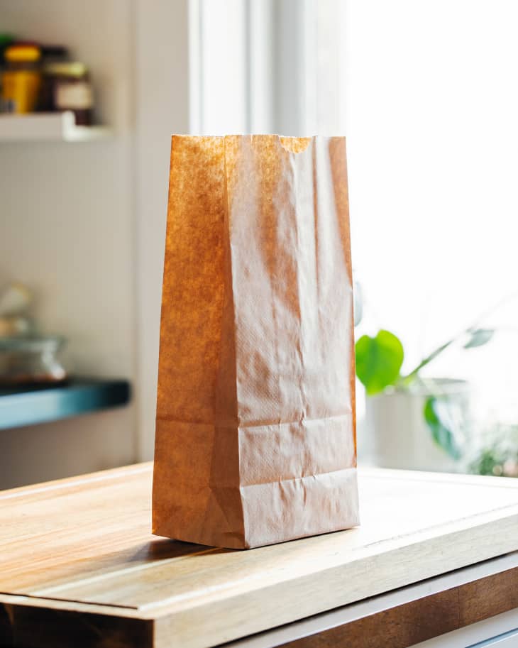 Paper bag on countertop.