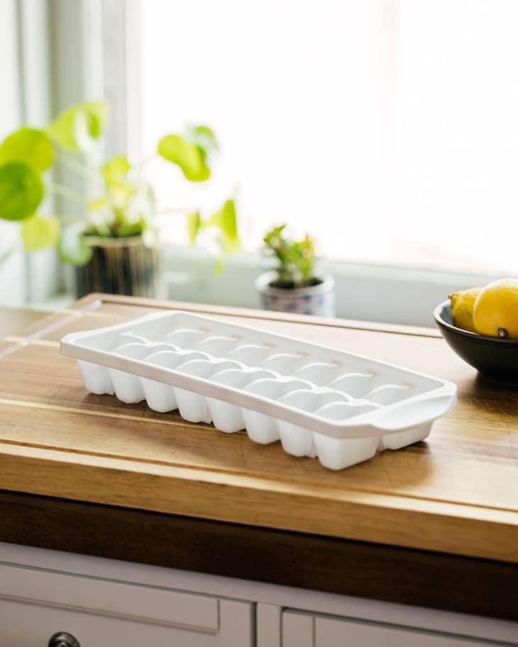 Ice tray on kitchen countertop.