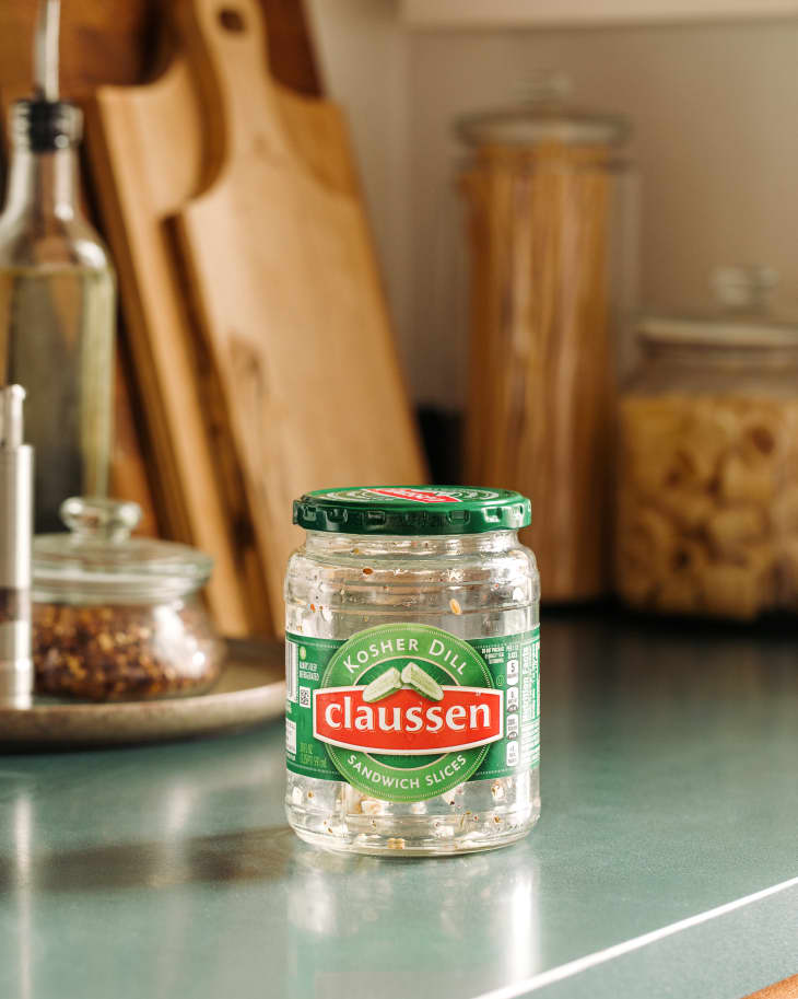 Empty pickle jar on countertop.